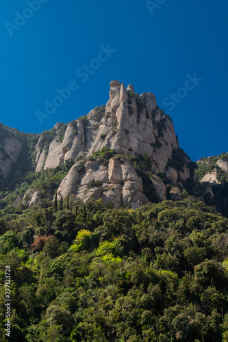 Montserrat, Spain - April, 2019: Santa Maria de Montserrat Abbey in Monistrol de Montserrat, Catalonia, Spain. Famous for the Virgin of Montserrat.
