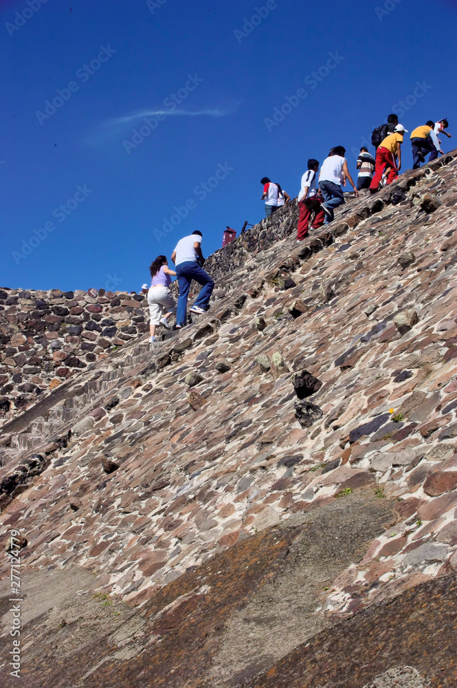 climbing the pyramid of the sun, teotihuacan, mexico