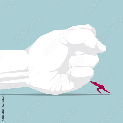 Businessman pushes the fist. Isolated on blue background.