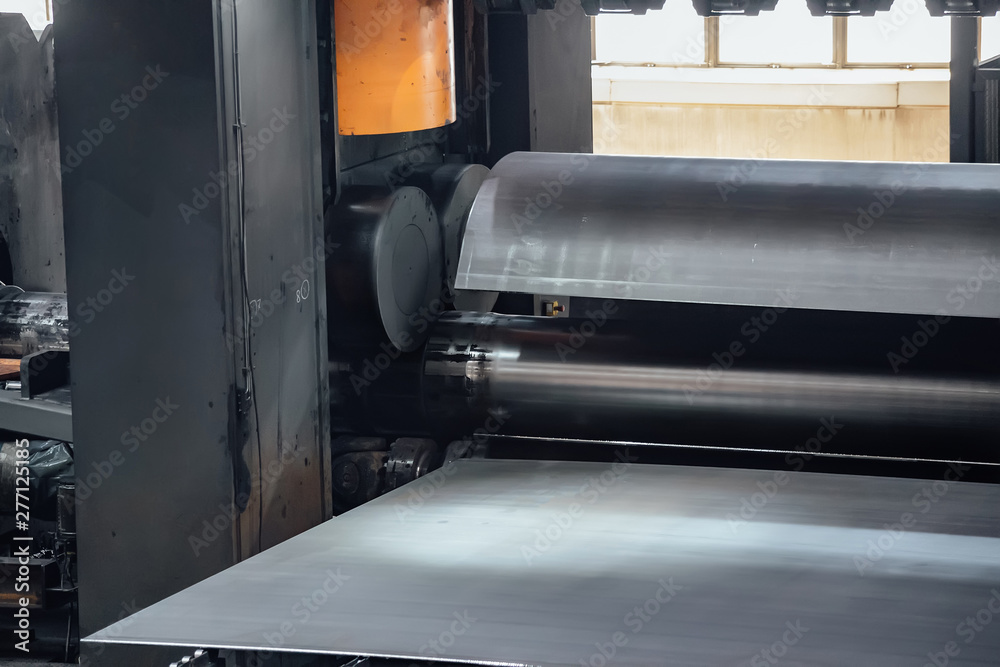 Pipe formation by using roll bending machine, close up Pipe formation by using roll bending machine, close up