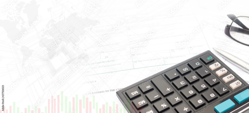 calculator and documents for working on the table, Finance and savings, Business concept. calculator and documents for working on the table, Finance and savings, Business concept.