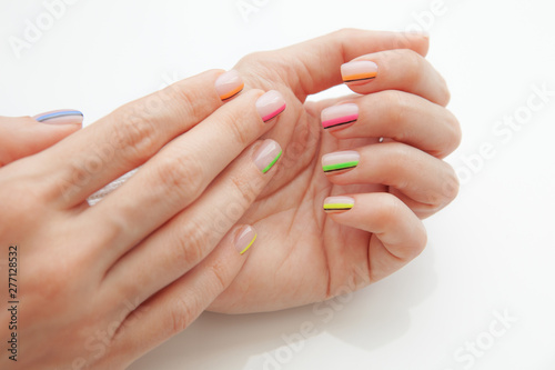 Multicolored modern manicure  nail design. Summer mood  on white background.