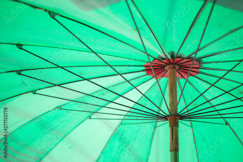 Under the green umbrella texture background
