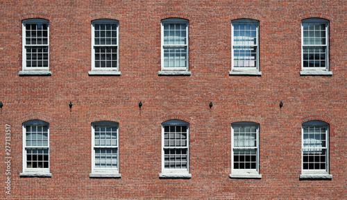 facade view of brick wall and window of old factory building