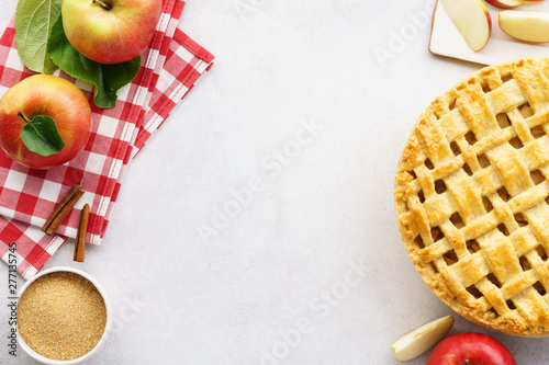 Obraz na płótnie Homemade apple pie with lattice top and ingredients.