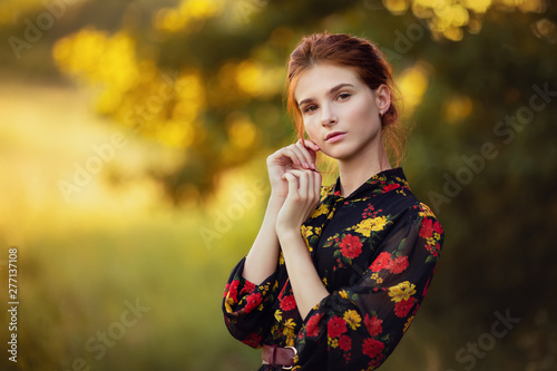 outdoors portrait of beautiful young woman