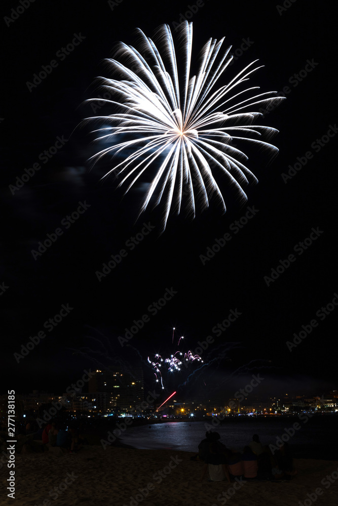 Beautiful firework in a small Spanish town Palamos, day of celebrating the town 06. 26. 2019 Beautiful firework in a small Spanish town Palamos, day of celebrating the town 06. 26. 2019