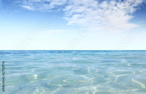 blue sky clouds sunshine on calm sea with sunlight reflection, empty background copy space