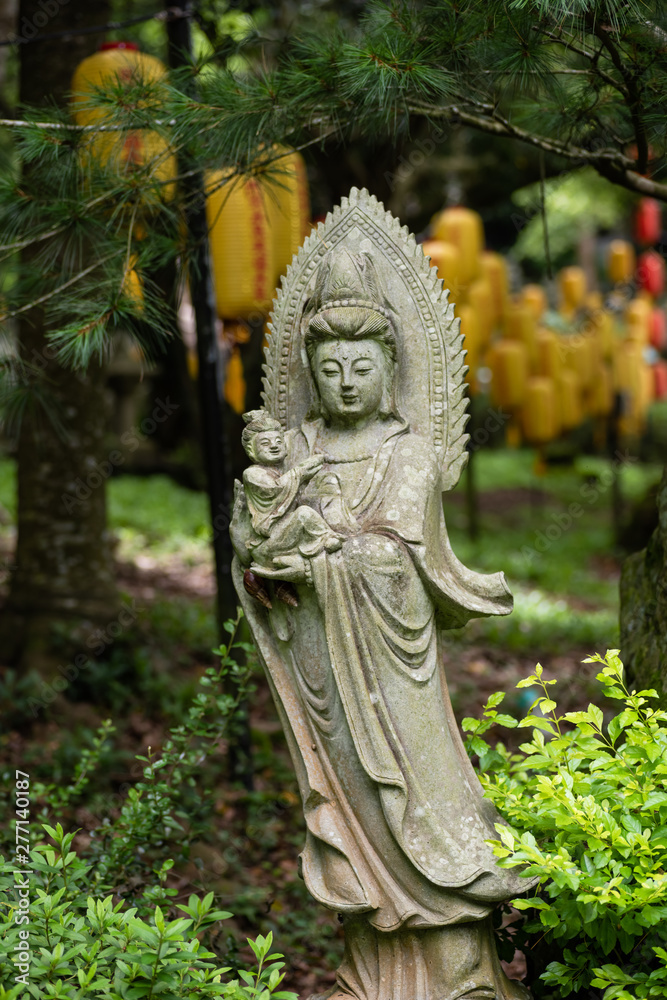 ancient stone bodhisattva statue