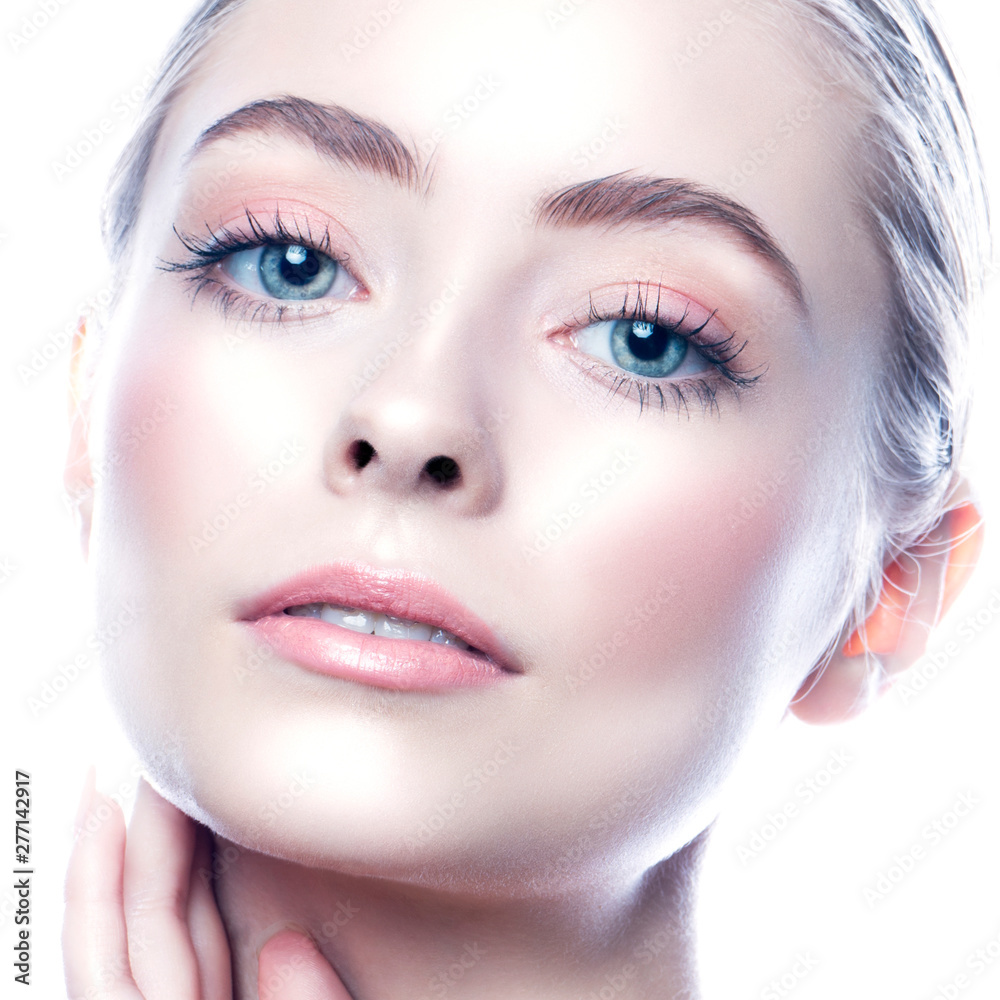 Close-up beauty young woman face. Attractive girl with perfect healthy  skin, blue eyes, blonde hair, natural nude makeup, pink eye shadows.  Skincare facial treatment spa concept Photos | Adobe Stock