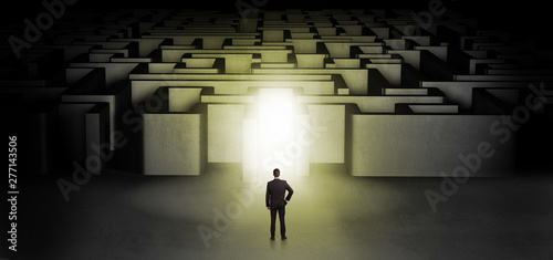 Lost businessman standing a...