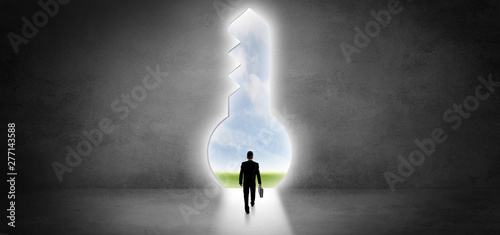 Businessman standing alone in front of a big keyhole
