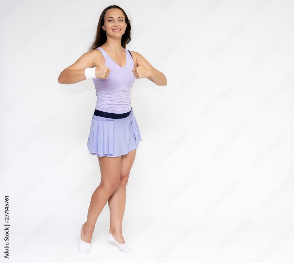 Full-length portrait on white background of beautiful pretty fitness girl woman in trendy tennis sport uniform, with different emotions in different poses, shows hands. Smiles. Stylish trendy youth. Full-length portrait on white background of beautiful pretty fitness girl woman in trendy tennis sport uniform, with different emotions in different poses, shows hands. Smiles. Stylish trendy youth.