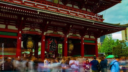 A timelapse of main old fashioned gate at Sensouji temple in Asakusa Tokyo wide shot panning photo