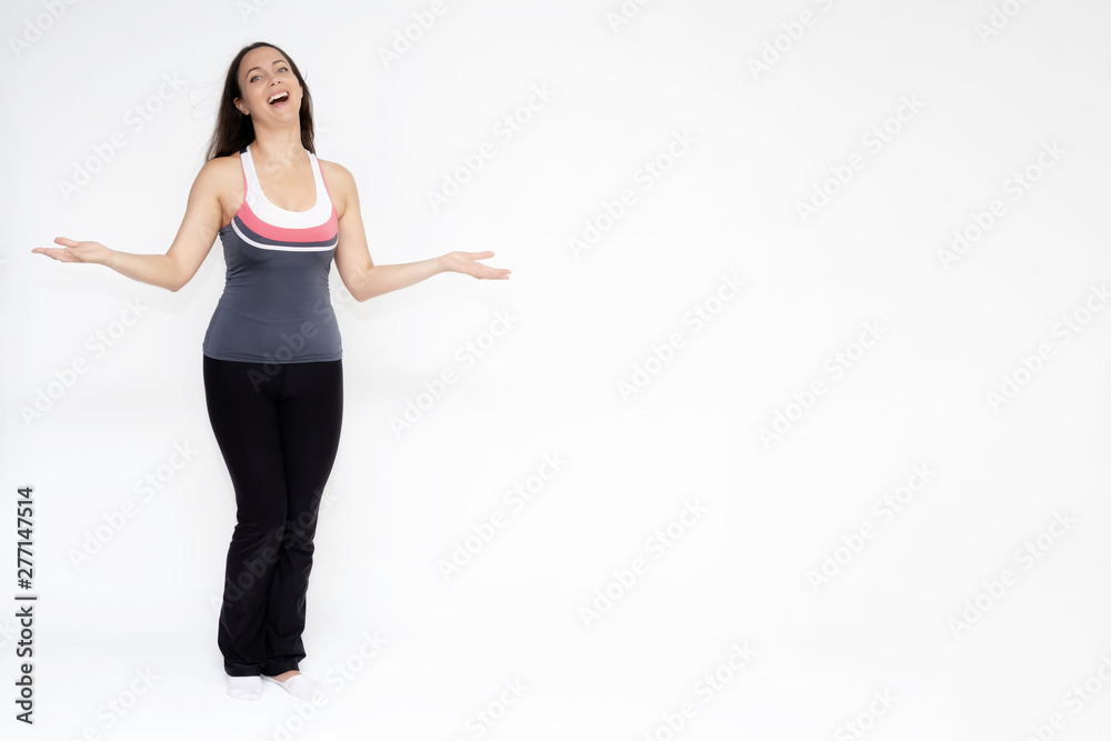 Full-length portrait on white background of beautiful pretty fitness girl woman in sports uniform, sitting on the stairs with different emotions in different poses. Stylish trendy youth. Full-length portrait on white background of beautiful pretty fitness girl woman in sports uniform, sitting on the stairs with different emotions in different poses. Stylish trendy youth.