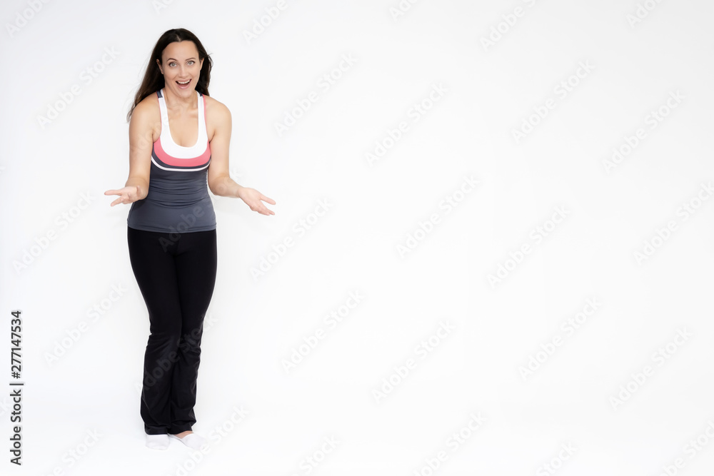 Full-length portrait on white background of beautiful pretty fitness girl woman in sports uniform, sitting on the stairs with different emotions in different poses. Stylish trendy youth. Full-length portrait on white background of beautiful pretty fitness girl woman in sports uniform, sitting on the stairs with different emotions in different poses. Stylish trendy youth.