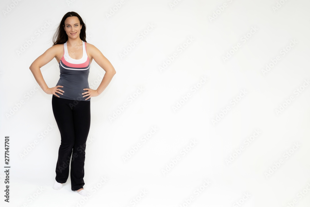 Full-length portrait on white background of beautiful pretty fitness girl woman in sports uniform, sitting on the stairs with different emotions in different poses. Stylish trendy youth. Full-length portrait on white background of beautiful pretty fitness girl woman in sports uniform, sitting on the stairs with different emotions in different poses. Stylish trendy youth.