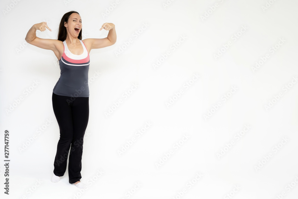 Full-length portrait on white background of beautiful pretty fitness girl woman in sports uniform, sitting on the stairs with different emotions in different poses. Stylish trendy youth. Full-length portrait on white background of beautiful pretty fitness girl woman in sports uniform, sitting on the stairs with different emotions in different poses. Stylish trendy youth.
