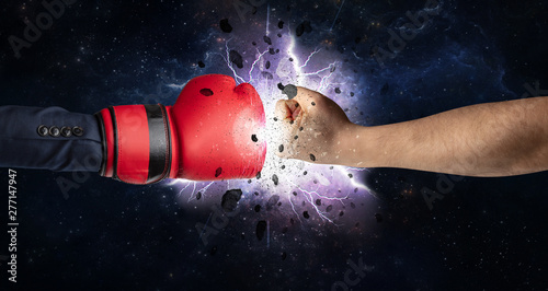 Two hands fighting with storm explosion concept © ra2 studio