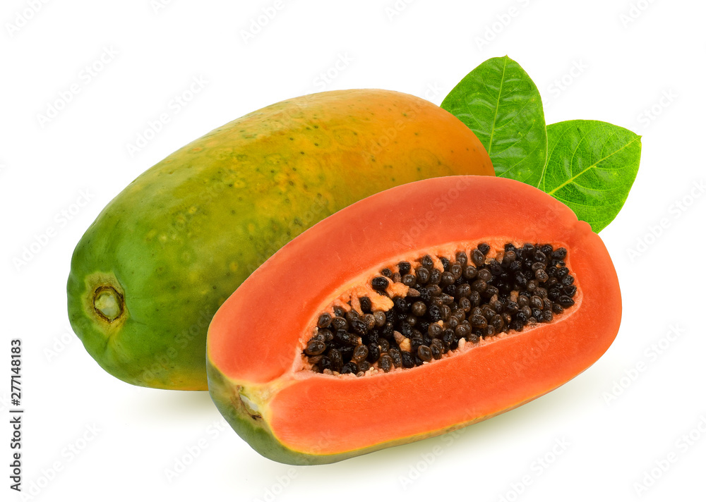 whole and half of ripe papaya fruit with green leaf isolated on white background whole and half of ripe papaya fruit with green leaf isolated on white background