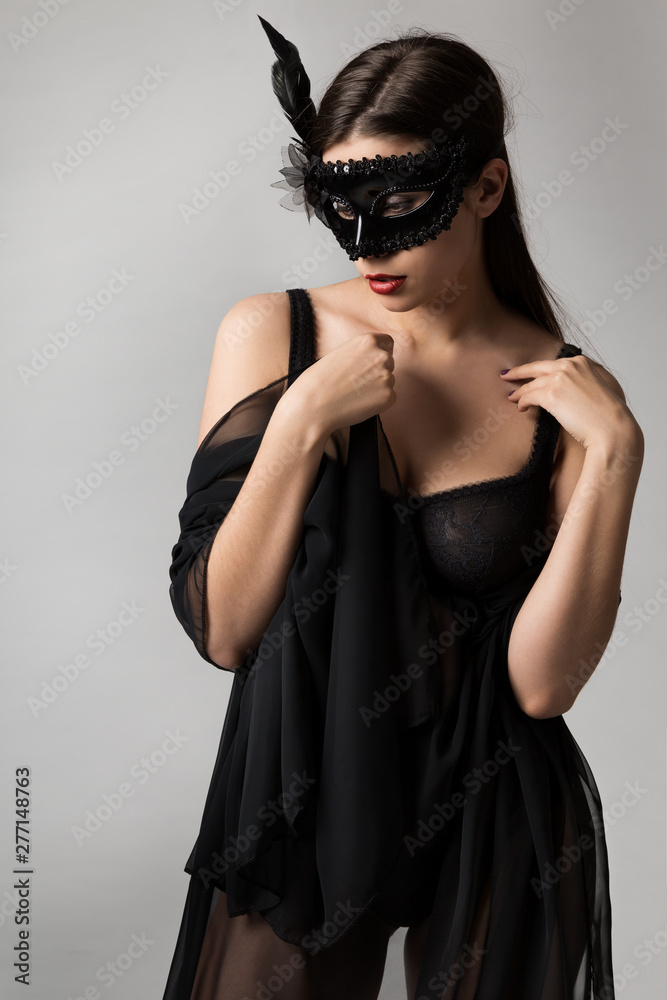 Fashion Model Mask, Sensual Woman Black Sexy Underwear, Studio Beauty Portrait on White Fashion Model Mask, Sensual Woman Black Sexy Underwear, Studio Beauty Portrait on White