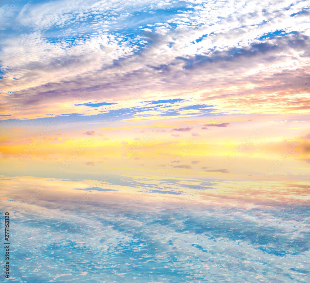 Beautiful sunset, sunrise with sky reflection at the calm water. Sky and water background Beautiful sunset, sunrise with sky reflection at the calm water. Sky and water background