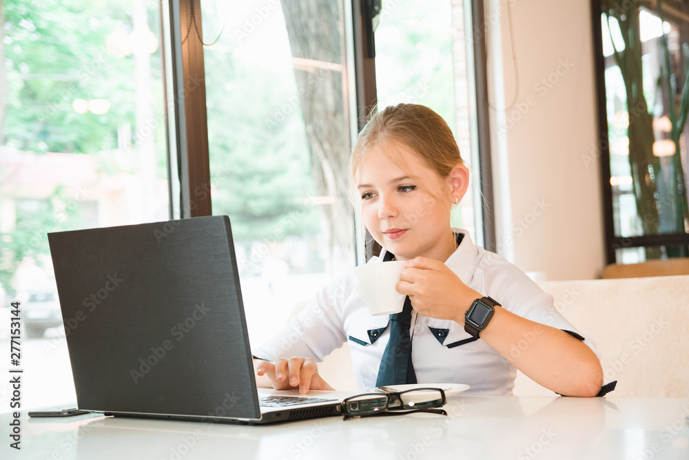 Charismatic girl as a businesswoman in cafe at lunch. Business youth. Charismatic girl as a businesswoman in cafe at lunch. Business youth.