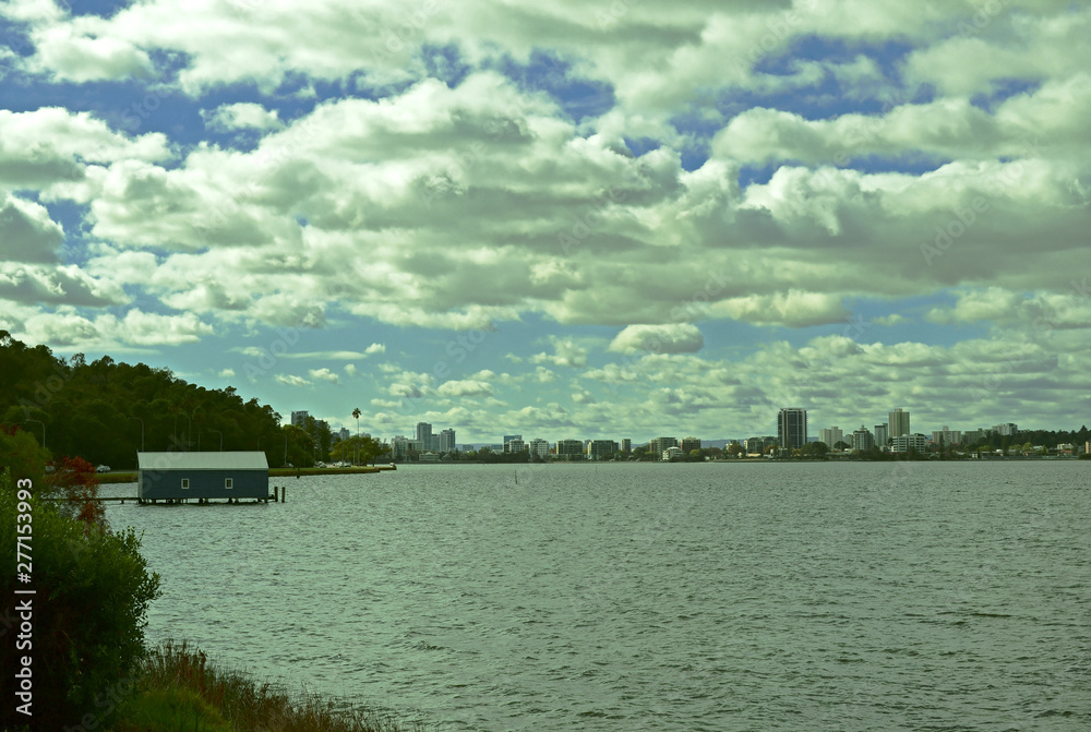 View of Crawley Edge Boatshed, Blue Boat House with blue sky and white cloud in Perth, Australia