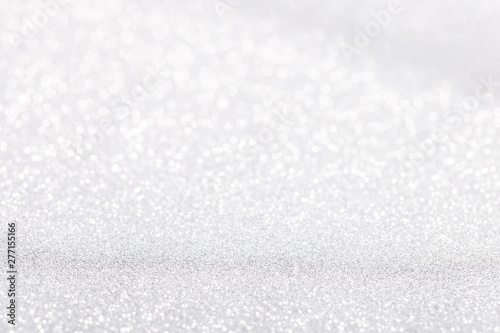 Silver white sparkle bokeh background © torriphoto