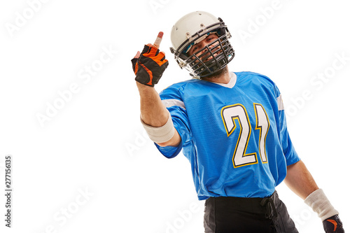 American football player in uniform shows hand fuck. American football, copy space, white background.