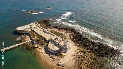 aerial View of the Castillo Sancti Petri on the Costa de la Luz in Andalusia photo