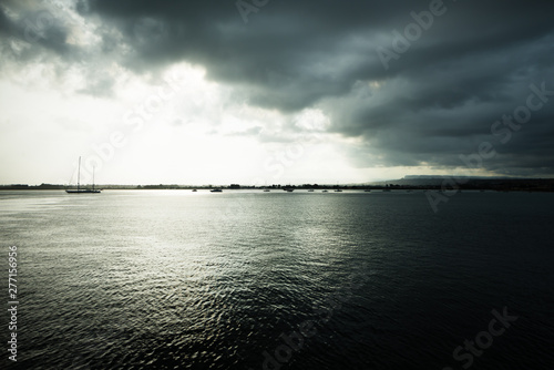 Dramatic view of the horizon on a rainy day from the tourist port of Ortigia in Syracuse.