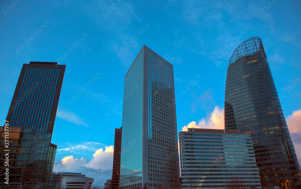modern skyscrapers against evening sky modern skyscrapers against evening sky