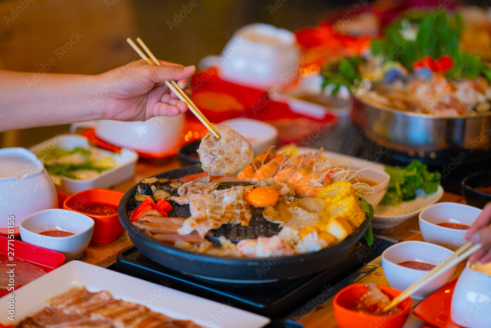 Selective focus Shabu Shabu and Sukiyaki, Japanese food with grill and pot boil Selective focus Shabu Shabu and Sukiyaki, Japanese food with grill and pot boil