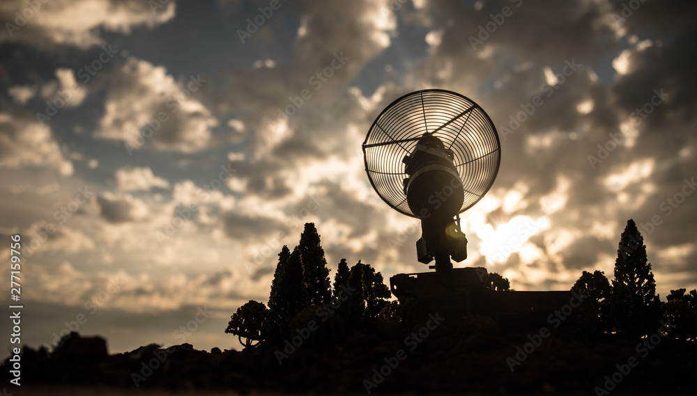 Silhouettes of satellite dishes or radio antennas against sunset sky. Space observatory. Silhouettes of satellite dishes or radio antennas against sunset sky. Space observatory.