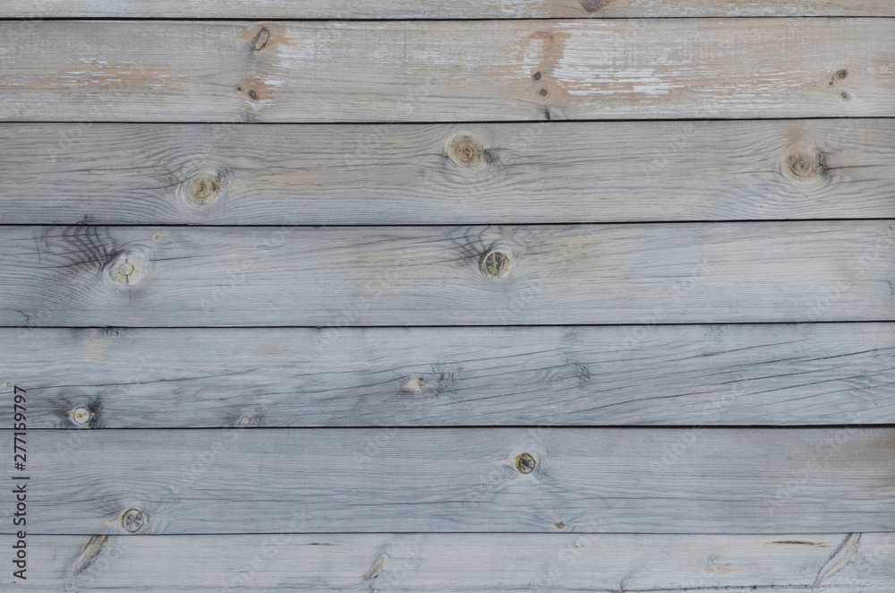Obraz premium Gray outdoor wooden surface composed of elements. Wooden texture.
