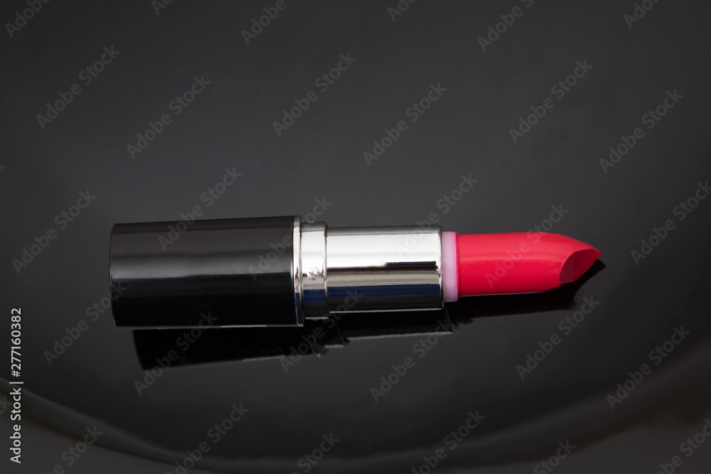 isolated red lip lipstick on a black background isolated red lip lipstick on a black background