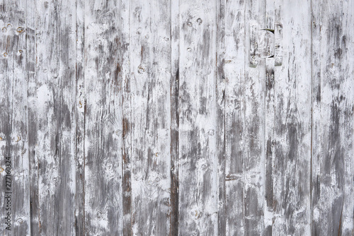 A rough white wooden wall texture.