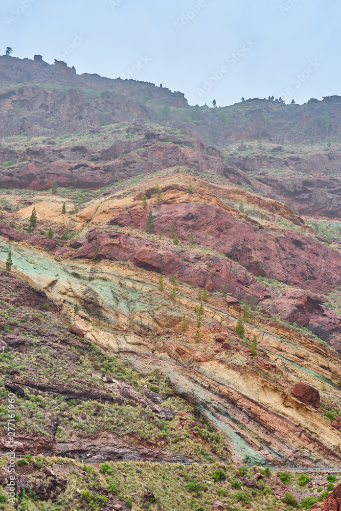 Natural phenomenon of the colorful mountains in the west of the island of Gran Canaria / so-called 