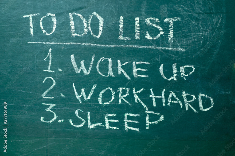 To do list it handwritten with white chalk on a green blackboard. To do list it handwritten with white chalk on a green blackboard.