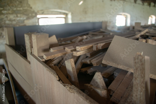 Taking photographs of wood plywood, used for making pellets