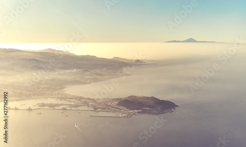 Capital of Gran Canararia from above   Las Palmas with harbor   Volcano  Teide  in the back and peninsula  La Isleta  in the front