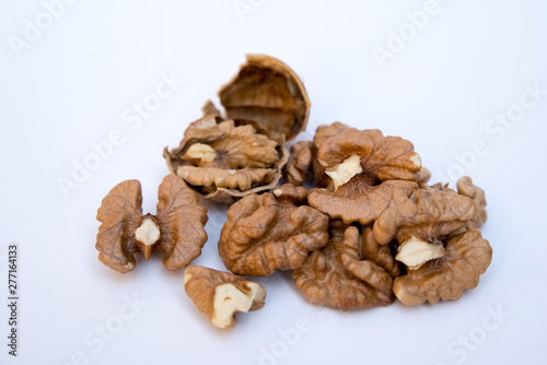 Walnuts kernels on white background. Healthy food.