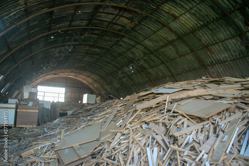 Taking photographs of wood plywood, used for making pellets