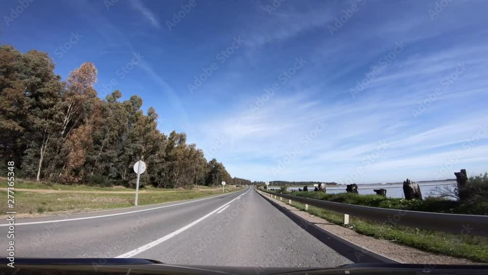 4K, POV view of car driving on the long road in countryside of Spain. Spanish landscape of the field in a bright and sunny day.-Dan 4K, POV view of car driving on the long road in countryside of Spain. Spanish landscape of the field in a bright and sunny day.-Dan