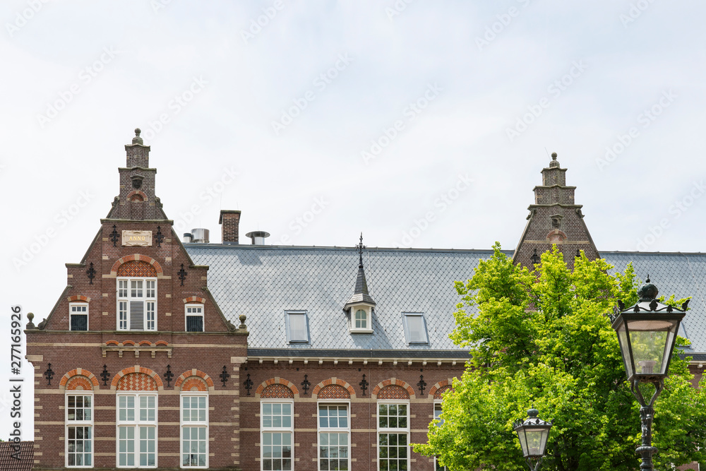detail of historical building in street called Vloeddijk, in Kampen, The Netherlands