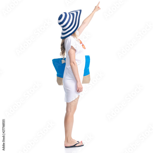 Woman in sun hat, sunglasses and beach bag summer smiling happiness looking showing pointing on white background isolation