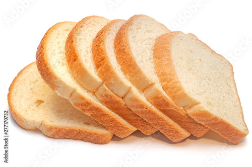 Fototapeta A loaf of fresh bread isolated on white background