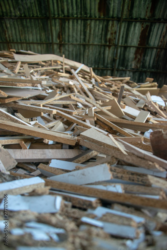 Taking photographs of wood plywood, used for making pellets