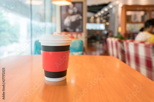 Coffee takeout cups are on the table © onlyyouqj